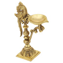 Brass peacock parrot Diya - exquisitely crafted brass oil lamp in the shape of a peacock with parrot motifs, golden finish, decorative home accent, fusion of elegance and vibrancy, traditional Indian Diya, emits a captivating and auspicious glow, perfect for festive occasions and religious ceremonies, enhances spiritual ambiance and decor with a touch of artistic brilliance.