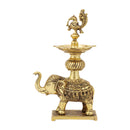 Brass peacock parrot Diya - exquisitely crafted brass oil lamp in the shape of a peacock with parrot motifs, golden finish, decorative home accent, fusion of elegance and vibrancy, traditional Indian Diya, emits a captivating and auspicious glow, perfect for festive occasions and religious ceremonies, enhances spiritual ambiance and decor with a touch of artistic brilliance.