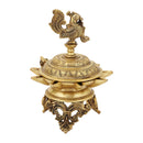 Brass peacock parrot Diya - exquisitely crafted brass oil lamp in the shape of a peacock with parrot motifs, golden finish, decorative home accent, fusion of elegance and vibrancy, traditional Indian Diya, emits a captivating and auspicious glow, perfect for festive occasions and religious ceremonies, enhances spiritual ambiance and decor with a touch of artistic brilliance.
