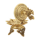 Brass peacock parrot Diya - exquisitely crafted brass oil lamp in the shape of a peacock with parrot motifs, golden finish, decorative home accent, fusion of elegance and vibrancy, traditional Indian Diya, emits a captivating and auspicious glow, perfect for festive occasions and religious ceremonies, enhances spiritual ambiance and decor with a touch of artistic brilliance.
