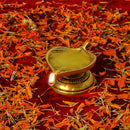 Brass Leaf Diya - elegantly crafted brass oil lamp in the shape of a leaf, golden finish, decorative home accent, inspired by nature's beauty, traditional Indian Diya, emits a soft and serene glow, ideal for religious ceremonies and festive occasions, enhances spiritual ambiance and decor with a touch of natural charm.