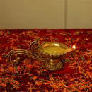 Brass Diya - exquisitely crafted brass oil lamp, traditional design, golden finish, decorative home accent, symbolizes spirituality and enlightenment, emits a warm and tranquil glow, ideal for religious ceremonies and festive occasions, enhances ambiance and decor with a touch of traditional elegance.