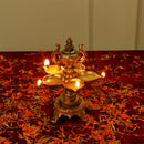 Brass Diya - exquisitely crafted brass oil lamp, traditional design, golden finish, decorative home accent, symbolizes spirituality and enlightenment, emits a warm and tranquil glow, ideal for religious ceremonies and festive occasions, enhances ambiance and decor with a touch of traditional elegance.