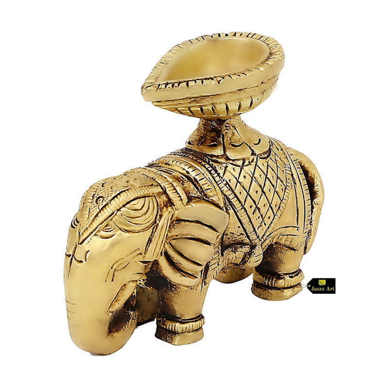 Brass Elephant Diya - intricately designed brass oil lamp in the shape of an elephant, golden finish, decorative home accent, symbolizes strength and wisdom, traditional Indian Diya, emits a warm and enchanting glow, ideal for religious ceremonies and festive occasions, enhances spiritual ambiance and decor