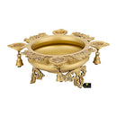 Brass 4 Diya Urli - beautifully crafted brass decorative bowl with four diya (oil lamp) holders, golden finish, traditional Indian Urli, versatile home accent, ideal for lighting multiple diya simultaneously, adds a touch of warmth and radiance to any space, perfect for creating a festive ambiance and enhancing interior decor, a charming centerpiece for religious ceremonies and celebratory occasions.