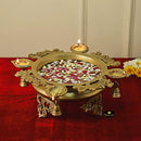 Brass 4 Diya Urli - beautifully crafted brass decorative bowl with four diya (oil lamp) holders, golden finish, traditional Indian Urli, versatile home accent, ideal for lighting multiple diya simultaneously, adds a touch of warmth and radiance to any space, perfect for creating a festive ambiance and enhancing interior decor, a charming centerpiece for religious ceremonies and celebratory occasions.