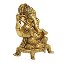 Brass God Ganesha Ji - intricately designed brass statue of Lord Ganesha, golden finish, auspicious and beloved deity, perfect for home decor and spiritual spaces, ideal for invoking blessings and removing obstacles, symbolizes wisdom, prosperity, and good fortune, enhances the spiritual energy and fosters a sense of divine presence, a sacred and revered addition to your collection of brass sculptures and figurines.