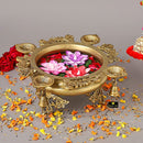 Brass 4 Diya Urli - beautifully crafted brass decorative bowl with four diya (oil lamp) holders, golden finish, traditional Indian Urli, versatile home accent, ideal for lighting multiple diya simultaneously, adds a touch of warmth and radiance to any space, perfect for creating a festive ambiance and enhancing interior decor, a charming centerpiece for religious ceremonies and celebratory occasions.