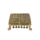 Brass Chowki - intricately carved brass platform, golden finish, perfect for placing deities or sacred objects during religious ceremonies and rituals, enhances the sanctity and beauty of the worship space, symbolizes stability and divine presence, adds a touch of elegance to your home puja setup, a valuable and ornamental addition to your collection of brass religious artifacts and decor.