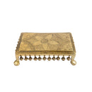 Brass Chowki - intricately carved brass platform, golden finish, perfect for placing deities or sacred objects during religious ceremonies and rituals, enhances the sanctity and beauty of the worship space, symbolizes stability and divine presence, adds a touch of elegance to your home puja setup, a valuable and ornamental addition to your collection of brass religious artifacts and decor. 