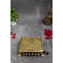 Brass Chowki - intricately carved brass platform, golden finish, perfect for placing deities or sacred objects during religious ceremonies and rituals, enhances the sanctity and beauty of the worship space, symbolizes stability and divine presence, adds a touch of elegance to your home puja setup, a valuable and ornamental addition to your collection of brass religious artifacts and decor.