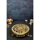 Brass Chowki - intricately carved brass platform, golden finish, perfect for placing deities or sacred objects during religious ceremonies and rituals, enhances the sanctity and beauty of the worship space, symbolizes stability and divine presence, adds a touch of elegance to your home puja setup, a valuable and ornamental addition to your collection of brass religious artifacts and decor.