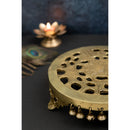 Brass Chowki - intricately carved brass platform, golden finish, perfect for placing deities or sacred objects during religious ceremonies and rituals, enhances the sanctity and beauty of the worship space, symbolizes stability and divine presence, adds a touch of elegance to your home puja setup, a valuable and ornamental addition to your collection of brass religious artifacts and decor.