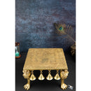 Brass Chowki - intricately carved brass platform, golden finish, perfect for placing deities or sacred objects during religious ceremonies and rituals, enhances the sanctity and beauty of the worship space, symbolizes stability and divine presence, adds a touch of elegance to your home puja setup, a valuable and ornamental addition to your collection of brass religious artifacts and decor.