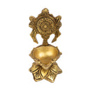 Brass Chakra Diya - beautifully crafted brass oil lamp with Chakra design, golden finish, decorative home accent, traditional Indian Diya, symbolizes spiritual energy and balance, emits a radiant and peaceful glow, perfect for rituals and meditation, enhances spiritual ambiance and decor