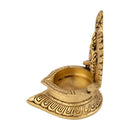 Brass Shank Diya - intricately designed brass oil lamp in the shape of a conch shell, golden finish, decorative home accent, symbolizes purity and spirituality, traditional Indian Diya, emits a radiant and calming glow, perfect for religious ceremonies and meditation, enhances spiritual ambiance and decor with a touch of serenity.