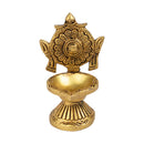 Brass Chakra Diya - beautifully crafted brass oil lamp with Chakra design, golden finish, decorative home accent, traditional Indian Diya, symbolizes spiritual energy and balance, emits a radiant and peaceful glow, perfect for rituals and meditation, enhances spiritual ambiance and decor