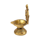 Brass Chakra Diya - beautifully crafted brass oil lamp with Chakra design, golden finish, decorative home accent, traditional Indian Diya, symbolizes spiritual energy and balance, emits a radiant and peaceful glow, perfect for rituals and meditation, enhances spiritual ambiance and decor