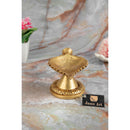 Brass Leaf Diya - elegantly crafted brass oil lamp in the shape of a leaf, golden finish, decorative home accent, inspired by nature's beauty, traditional Indian Diya, emits a soft and serene glow, ideal for religious ceremonies and festive occasions, enhances spiritual ambiance and decor with a touch of natural charm.