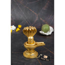 Brass Shivling - intricately crafted brass Shivling (Shiva Lingam), golden finish, sacred symbol of Lord Shiva, perfect for worship and meditation, ideal for creating a divine ambiance in your home or temple, symbolizes the cosmic energy and represents the formless nature of Lord Shiva, enhances spiritual practices and fosters a sense of reverence, a beautiful and sacred addition to your collection of brass artifacts.