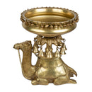 Brass Camel Urli - exquisitely designed brass decorative bowl adorned with camel motifs, golden finish, traditional Indian Urli, versatile home accent, ideal for floating flower petals or candles, symbolizes resilience and adventure, adds a touch of cultural charm and elegance to any space, perfect for creating a captivating ambiance and enhancing interior decor, a timeless piece of art for both indoor and outdoor settings.