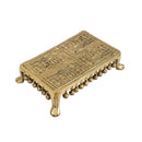 Brass Chowki - intricately carved brass platform, golden finish, perfect for placing deities or sacred objects during religious ceremonies and rituals, enhances the sanctity and beauty of the worship space, symbolizes stability and divine presence, adds a touch of elegance to your home puja setup, a valuable and ornamental addition to your collection of brass religious artifacts and decor.