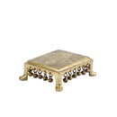 Brass Chowki - intricately carved brass platform, golden finish, perfect for placing deities or sacred objects during religious ceremonies and rituals, enhances the sanctity and beauty of the worship space, symbolizes stability and divine presence, adds a touch of elegance to your home puja setup, a valuable and ornamental addition to your collection of brass religious artifacts and decor.