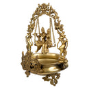 Brass Radha Krishna Ji Urli - intricately designed brass decorative bowl featuring idols of Radha and Krishna, golden finish, traditional Indian Urli, auspicious home accent, ideal for floating flower petals or candles, symbolizes divine love and devotion, adds a touch of spirituality and cultural beauty to any space, perfect for creating a serene ambiance and enhancing interior decor, a timeless piece of art for both indoor and outdoor settings.