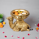 Brass Camel Urli - exquisitely designed brass decorative bowl adorned with camel motifs, golden finish, traditional Indian Urli, versatile home accent, ideal for floating flower petals or candles, symbolizes resilience and adventure, adds a touch of cultural charm and elegance to any space, perfect for creating a captivating ambiance and enhancing interior decor, a timeless piece of art for both indoor and outdoor settings.