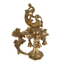 Brass peacock parrot Diya - exquisitely crafted brass oil lamp in the shape of a peacock with parrot motifs, golden finish, decorative home accent, fusion of elegance and vibrancy, traditional Indian Diya, emits a captivating and auspicious glow, perfect for festive occasions and religious ceremonies, enhances spiritual ambiance and decor with a touch of artistic brilliance.
