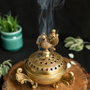 Brass Dhoop Dani - elegantly designed brass incense holder, ideal for burning incense cones or dhoop, golden finish, perfect for home rituals and meditation spaces, enhances the ambiance and fragrance during spiritual practices, symbolizes purification and spiritual elevation, a beautiful and practical addition to your collection of brass incense holders and spiritual accessories.
