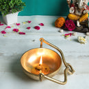 Brass Urli - beautifully crafted brass decorative bowl, golden finish, traditional Indian Urli, versatile home accent, ideal for floating flower petals or candles, adds a touch of elegance and tranquility to any space, perfect for creating a serene ambiance and enhancing interior decor, a timeless piece of art for both indoor and outdoor settings.