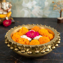 Brass 4 Diya Urli - beautifully crafted brass decorative bowl with four diya (oil lamp) holders, golden finish, traditional Indian Urli, versatile home accent, ideal for lighting multiple diya simultaneously, adds a touch of warmth and radiance to any space, perfect for creating a festive ambiance and enhancing interior decor, a charming centerpiece for religious ceremonies and celebratory occasions.