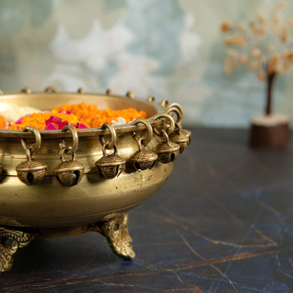 Brass Urli - beautifully crafted brass decorative bowl, golden finish, traditional Indian Urli, versatile home accent, ideal for floating flower petals or candles, adds a touch of elegance and tranquility to any space, perfect for creating a serene ambiance and enhancing interior decor, a timeless piece of art for both indoor and outdoor settings.