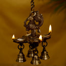 Brass peacock parrot Diya - exquisitely crafted brass oil lamp in the shape of a peacock with parrot motifs, golden finish, decorative home accent, fusion of elegance and vibrancy, traditional Indian Diya, emits a captivating and auspicious glow, perfect for festive occasions and religious ceremonies, enhances spiritual ambiance and decor with a touch of artistic brilliance.