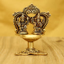 Brass Ganesha Lakshmi Diya - exquisitely crafted brass oil lamp featuring Lord Ganesha and Goddess Lakshmi, golden finish, decorative home accent, symbolizes prosperity and divine blessings, traditional Indian Diya, emits a radiant and auspicious glow, perfect for religious ceremonies and festive occasions, enhances spiritual ambiance and decor with the blessings of Ganesha and Lakshmi.