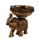 Brass Elephant Urli - meticulously designed brass decorative bowl featuring elephant motifs, golden finish, traditional Indian Urli, versatile home accent, ideal for floating flower petals or candles, symbolizes strength and wisdom, adds a touch of cultural charm and serenity to any space, perfect for creating an inviting ambiance and enhancing interior decor, a timeless piece of art for both indoor and outdoor settings.