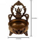 Brass Lakshmi & Ganesh Ji Urli - intricately crafted brass decorative bowl featuring idols of Goddess Lakshmi and Lord Ganesh, golden finish, traditional Indian Urli, versatile home accent, ideal for floating flower petals or candles, symbolizes prosperity and blessings, adds a touch of divinity and cultural richness to any space, perfect for creating an auspicious ambiance and enhancing interior decor, a timeless piece of art for both indoor and outdoor settings.