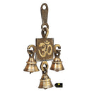 Brass OM Bells - intricately designed brass bells in the shape of the sacred Om symbol, golden finish, decorative home accent, emits a soothing and resonant sound, perfect for creating a calming and spiritual ambiance, ideal for meditation, yoga, and spiritual practices, symbolizes unity and divine energy, enhances the atmosphere with positive vibrations, a meaningful addition to your collection of brass artifacts