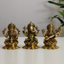 Brass God Lakshmi Ganesh Saraswati Ji - intricately crafted brass statue featuring Lord Lakshmi, Lord Ganesha, and Goddess Saraswati, golden finish, divine and auspicious deities, perfect for home decor and spiritual spaces, ideal for invoking blessings, prosperity, wisdom, and creativity, symbolizes wealth, intellect, and divine grace, enhances the spiritual energy and fosters a sense of divine presence, a sacred and harmonious addition to your collection of brass sculptures and figurines.