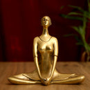Brass Yoga Lady - beautifully sculpted brass statue of a female yogi in a yoga pose, golden finish, represents strength, balance, and mindfulness, perfect for yoga enthusiasts and spiritual practitioners, adds a serene and calming element to your home decor, symbolizes the harmony between mind, body, and spirit, a unique and inspiring addition to your collection of brass sculptures and figurines, ideal for yoga studios and meditation spaces.