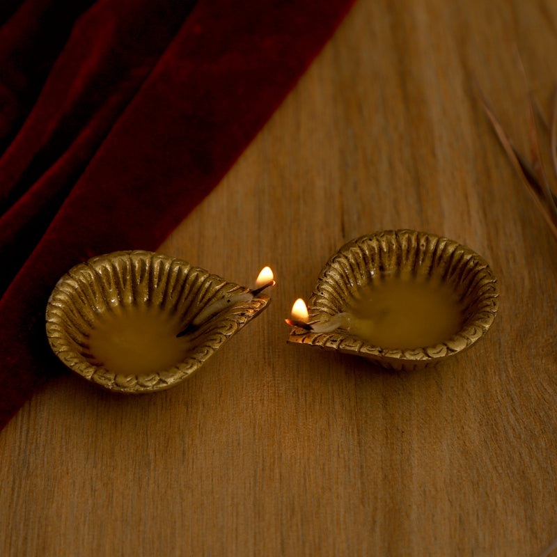 Brass small Akhand Diya - intricately designed brass oil lamp, compact size, traditional Indian Diya, golden finish, decorative home accent, emits a warm and serene glow, ideal for religious ceremonies and meditation, enhances spiritual ambiance and decor.