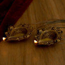 Brass small Akhand Diya - intricately designed brass oil lamp, compact size, traditional Indian Diya, golden finish, decorative home accent, emits a warm and serene glow, ideal for religious ceremonies and meditation, enhances spiritual ambiance and decor.