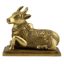 Brass God Nandi Cow - beautifully sculpted brass statue of Nandi, the sacred bull and vahana (vehicle) of Lord Shiva, golden finish, revered and divine deity, perfect for home decor and spiritual spaces, ideal for invoking blessings and divine guidance, symbolizes strength, devotion, and fertility, enhances the spiritual energy and fosters a sense of divine presence, a sacred and auspicious addition to your collection of brass sculptures and figurines.