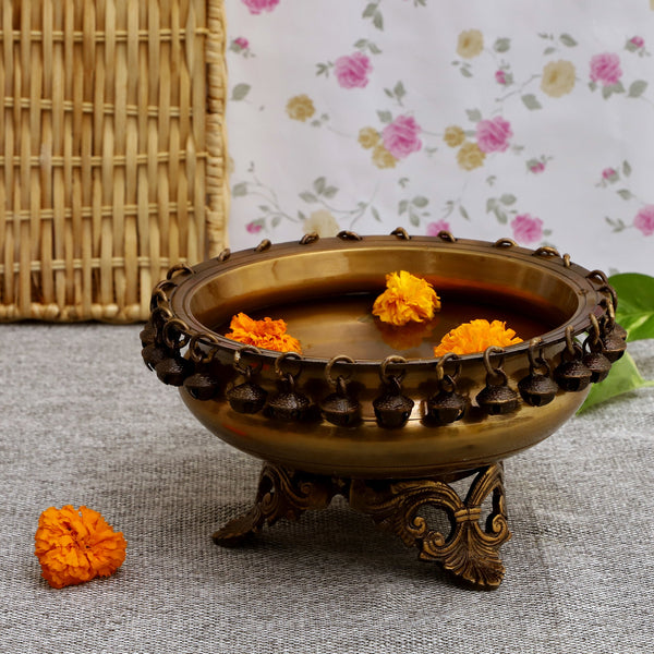 Brass Urli - beautifully crafted brass decorative bowl, golden finish, traditional Indian Urli, versatile home accent, ideal for floating flower petals or candles, adds a touch of elegance and tranquility to any space, perfect for creating a serene ambiance and enhancing interior decor, a timeless piece of art for both indoor and outdoor settings.