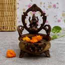 Brass Lakshmi & Ganesh Ji Urli - intricately crafted brass decorative bowl featuring idols of Goddess Lakshmi and Lord Ganesh, golden finish, traditional Indian Urli, versatile home accent, ideal for floating flower petals or candles, symbolizes prosperity and blessings, adds a touch of divinity and cultural richness to any space, perfect for creating an auspicious ambiance and enhancing interior decor, a timeless piece of art for both indoor and outdoor settings.